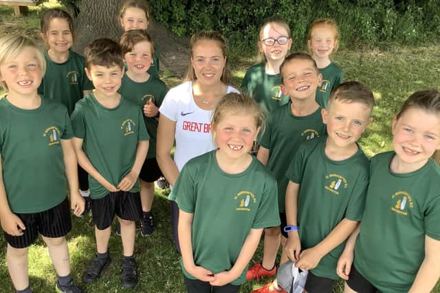 GB and Commonwealth Games Heptathlete, Katie Stainton, with pupils.