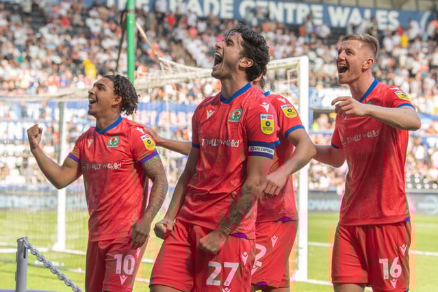 Blackburn Rovers' Lewis Travis (centre) celebrates scoring his side's third goal with team-mates
The EFL Sky Bet Championship - Swansea City v Blackburn Rovers - Saturday 6th August 2022 - Liberty Stadium - Swansea