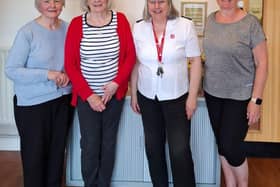 Volunteers with church leader of The Salvation Army in Ashton-in-Makerfield, Elaine Rogers