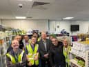 Trainees from The Hamlet welcome councillors to Poundland