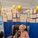 Alma with her card from the Palace