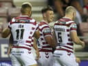 Wigan Warriors take on Leeds Rhinos for a place in the Grand Final
