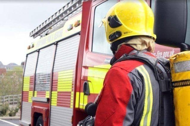 Firefighters tackled the blaze which spread to the temporary toilets