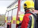 Firefighters tackled the blaze which spread to the temporary toilets