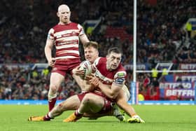 Tom Davies featured for Catalans Dragons during last year's Super League Grand Final against former club Wigan Warriors