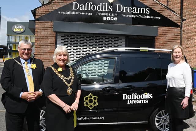 Mayor of Wigan Coun Marie Morgan and consort Coun Clive Morgan hand over the van to Maureen Holcroft, founder of Daffodils Dreams