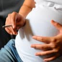 Pregnant woman smoking