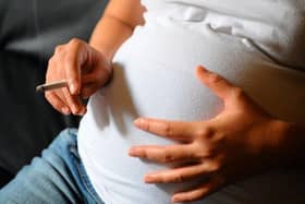 Pregnant woman smoking