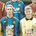 Greg Strong (centre) during his playing days with Latics