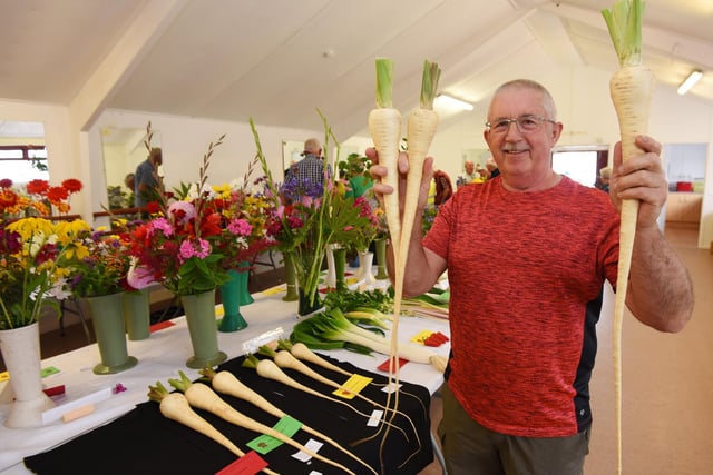 Ian Fairclough with his prize-winning parsnips