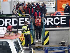 A group of people thought to be migrants are brought in to Dover, Kent, following a small boat incident in the Channel