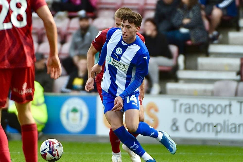 Chris Sze is currently sorting out 'personal issues' but will be back in the Latics fold before long, says Shaun Maloney