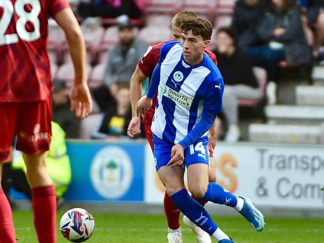 Chris Sze is currently sorting out 'personal issues' but will be back in the Latics fold before long, says Shaun Maloney