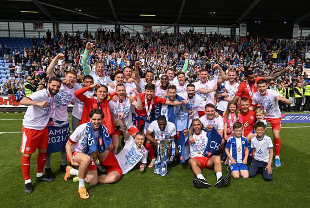 Wigan Athletic celebrate winning League One