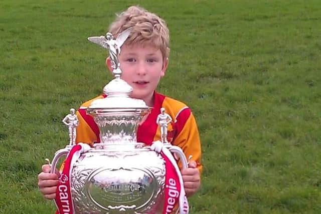 Gabriel Holt as a child