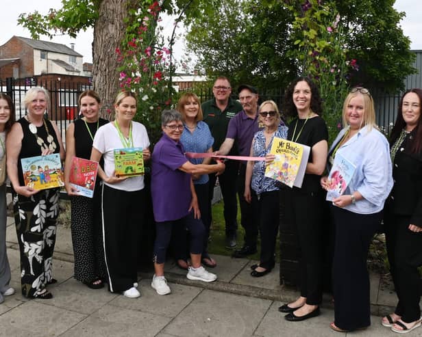 Members of the community joined staff from Golborne Library and volunteers from Golborne in Bloom to officially open the reading garden at Golborne Library