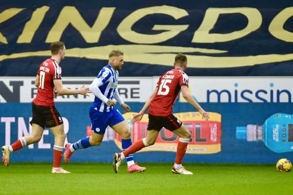 Stephen Humphrys struggles to find a way through against Lincoln