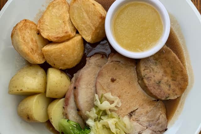 Roast loin of pork, apple sauce, mixed herbs and onion stuffing, at the Red Lion, Mawdesley