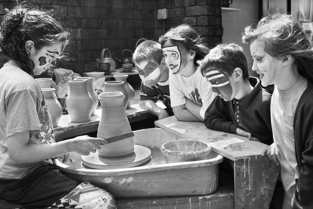 Wigan schoolchildren hands on practising their pottery skills during an open day at Drumcroon arts education centre on Parsons Walk on Saturday 14th of May 1994.
