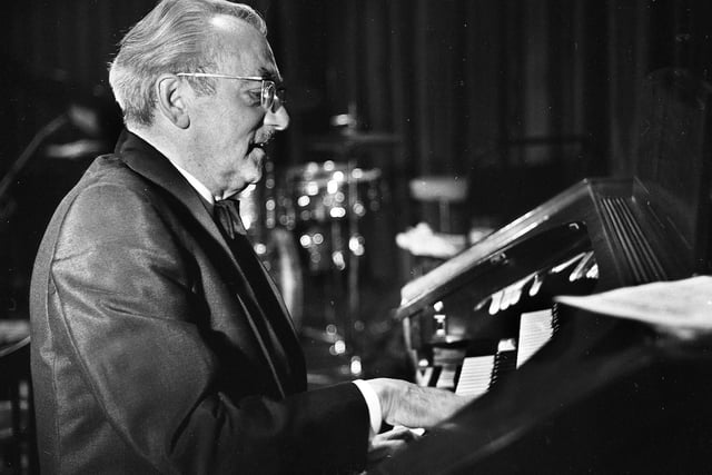 Famous organist, Reginald Dixon, playing during a visit to Wigan in the 1960s.  He was best known for being the organist at the Tower Ballroom in Blackpool where he was in residence for 40 years.  He made and sold more recordings than any other organist before him.  He died in 1985.