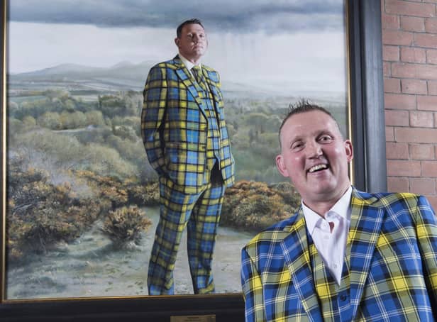 Doddie Weir with his painting in the Scottish National Portrait Gallery (SNPG)