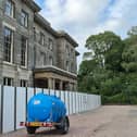The fence has been moved at the front of Haigh Hall, all of six feet nearer, what is occurring?