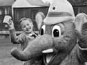 Fire Service mascot Welephant with Jennifer Raw a pupil at St. Peter's Primary School, Bryn, who won a fire safety slogan competition run by GMC Fire Service in February 1989.