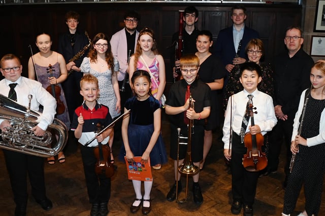 Some or the performers and organisers at Wigan Young Musicians - Grand Final 2023, held at St Wilfrid's Church, Standish.