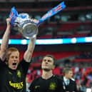 Ben Watson celebrating with the FA Cup