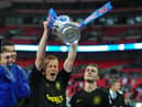 Ben Watson celebrating with the FA Cup