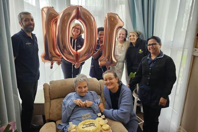 Staff at Lakeside Nursing Home in Standish celebrating Marion Anderton's 101st Birthday