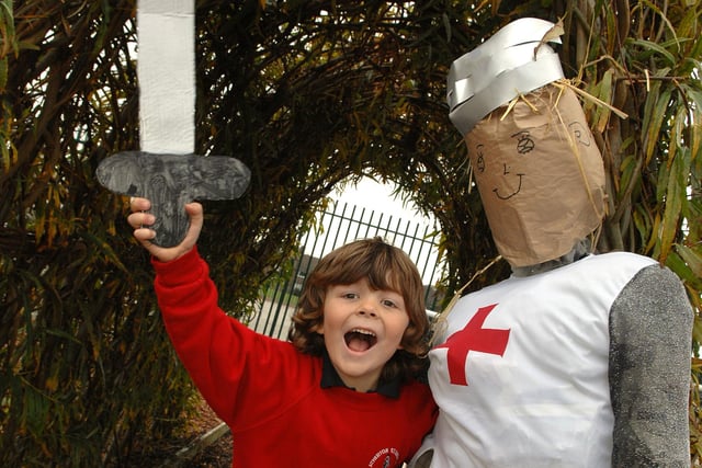 Ben, five, with St George scarecrow at the Scarecrow Festival at St George's Primary School, Atherton, 2010.