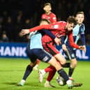 Luke Chambers battles for the ball in Latics' 1-0 defeat at Wycombe in midweek
