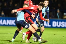 Luke Chambers battles for the ball in Latics' 1-0 defeat at Wycombe in midweek