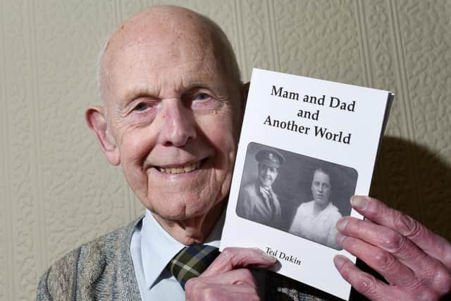 Ted Dakin with one of his books