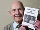 Ted Dakin with one of his books
