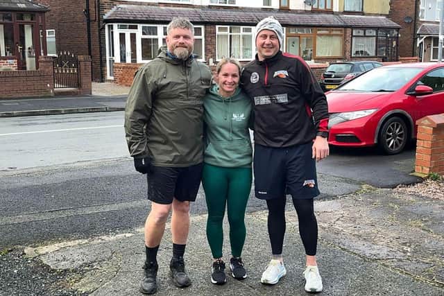 Jamie Dallimore (right) is joined by regular running companion Dean Byrom (left) and Steph Phillips on his daily 10k fundraising run