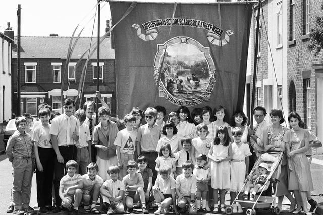 The Wigan Baptists Sunday School, Scarisbrick Street, line up for their walking day on Sunday 15th of June 1986.
