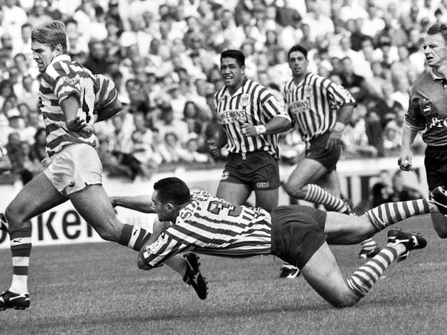 Wigan centre Gary Connolly storms clear to score one of his two tries against his old club St. Helens in a league match at Knowsley Road on Monday 28th of August 1995.
Wigan won 52-20.
