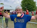 Jack Sharpe celebrates with his medal
