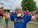 Jack Sharpe celebrates with his medal