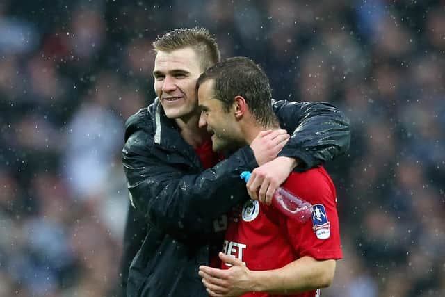 Callum McManaman and Shaun Maloney share a special moment after the FA Cup semi-final victory over Millwall in 2013