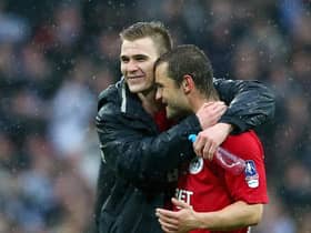 Callum McManaman and Shaun Maloney share a special moment after the FA Cup semi-final victory over Millwall in 2013