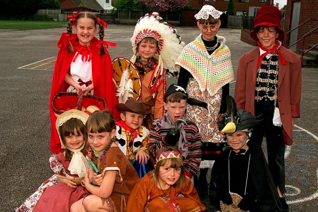 1999 - Children from St Johns primary school, Hindley,  dressed as their favourite characters for World Book Day.