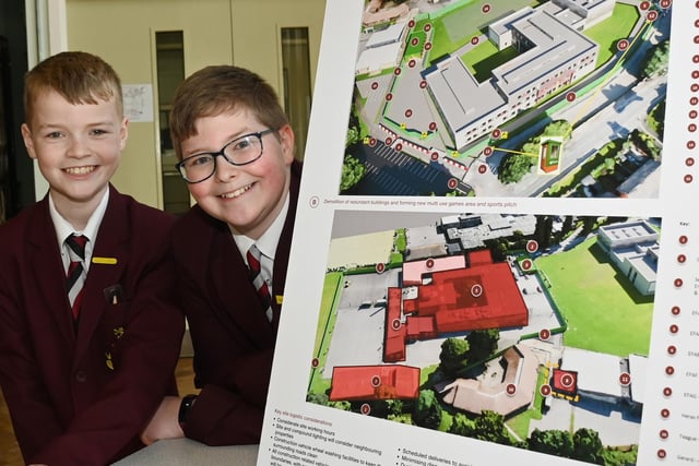 Year Seven pupils Sam Martin, 11, and Thomas Jennings, 12, right, take a look at the plans for their new school.
