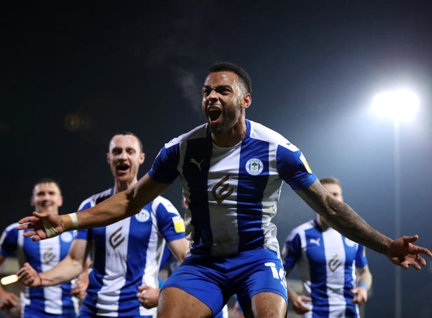FLEETWOOD, ENGLAND - NOVEMBER 02: Curtis Tilt of Wigan Athletic celebrates after scoring their side's third goal during the Sky Bet League One match between Fleetwood Town and Wigan Athletic at Highbury Stadium on November 02, 2021 in Fleetwood, England. (Photo by Lewis Storey/Getty Images)