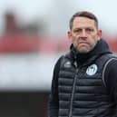 ACCRINGTON, ENGLAND - MARCH 20: Leam Richardson, Interim Manager of Wigan Athletic looks on as he makes his way across the pitch at the end of the first half during the Sky Bet League One match between Accrington Stanley and Wigan Athletic at The Crown Ground on March 20, 2021 in Accrington, England. (Photo by Lewis Storey/Getty Images)