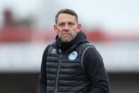 ACCRINGTON, ENGLAND - MARCH 20: Leam Richardson, Interim Manager of Wigan Athletic looks on as he makes his way across the pitch at the end of the first half during the Sky Bet League One match between Accrington Stanley and Wigan Athletic at The Crown Ground on March 20, 2021 in Accrington, England. (Photo by Lewis Storey/Getty Images)