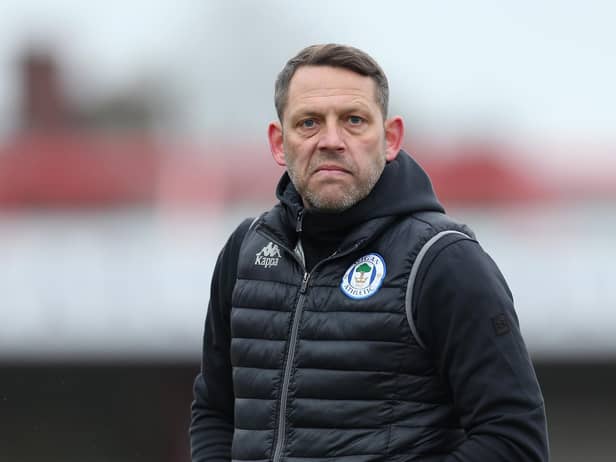 ACCRINGTON, ENGLAND - MARCH 20: Leam Richardson, Interim Manager of Wigan Athletic looks on as he makes his way across the pitch at the end of the first half during the Sky Bet League One match between Accrington Stanley and Wigan Athletic at The Crown Ground on March 20, 2021 in Accrington, England. (Photo by Lewis Storey/Getty Images)
