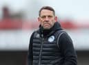 ACCRINGTON, ENGLAND - MARCH 20: Leam Richardson, Interim Manager of Wigan Athletic looks on as he makes his way across the pitch at the end of the first half during the Sky Bet League One match between Accrington Stanley and Wigan Athletic at The Crown Ground on March 20, 2021 in Accrington, England. (Photo by Lewis Storey/Getty Images)